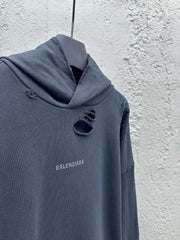 Hot stamping hooded sweatshirt with holes