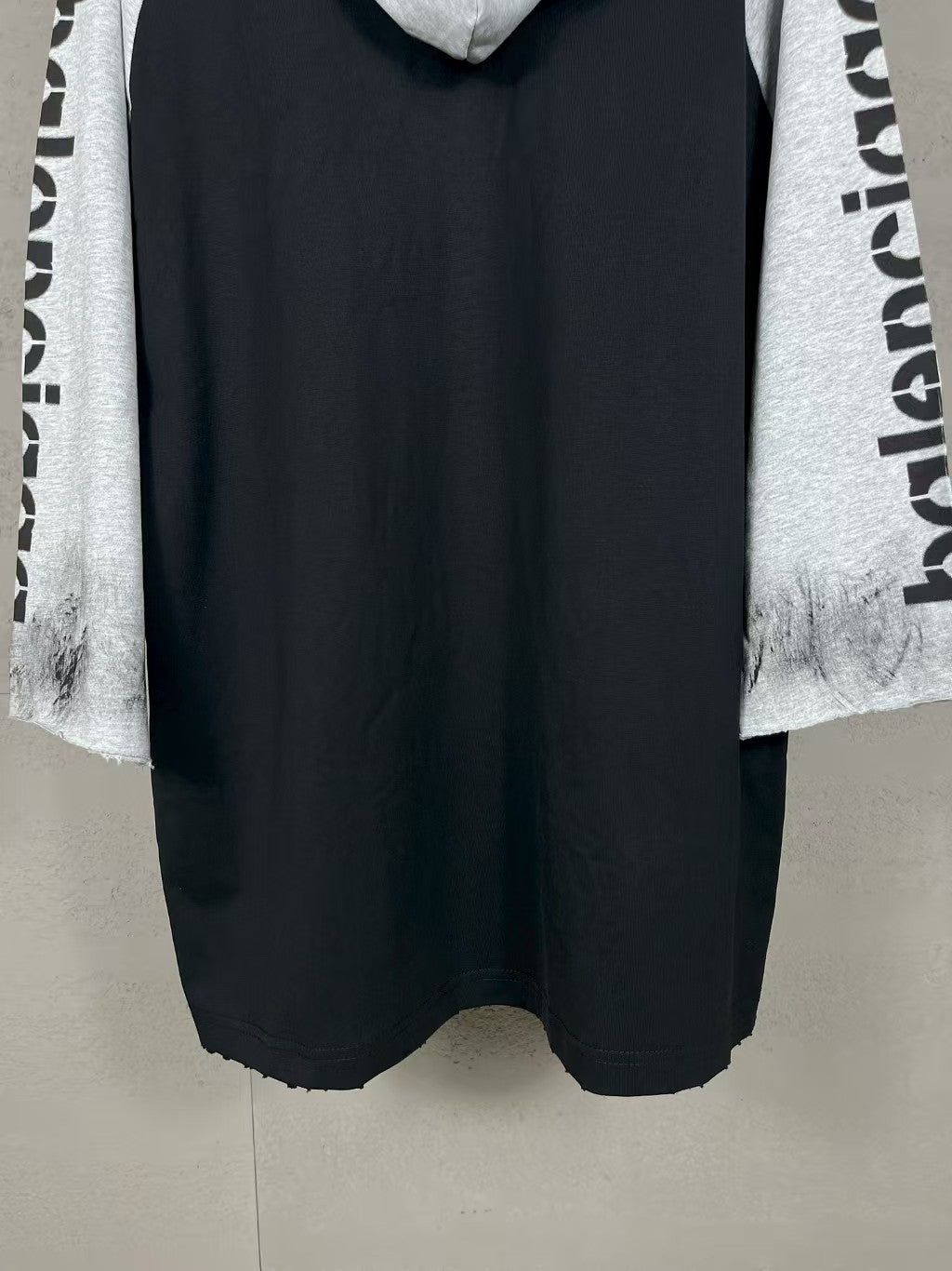 Seven inch hooded long sleeved T-shirt