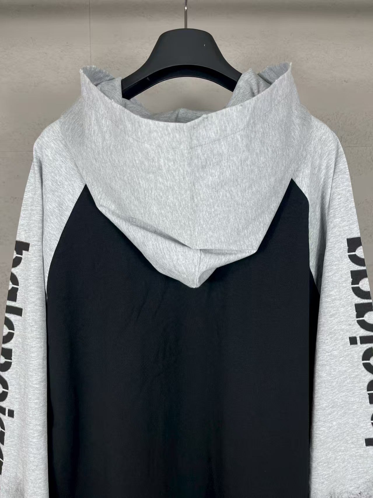 Seven inch hooded long sleeved T-shirt