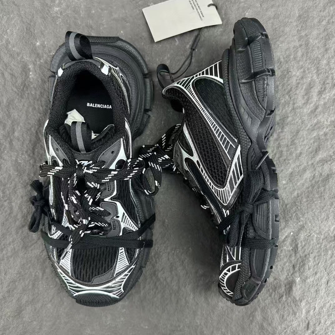 Black and white mesh sports shoes