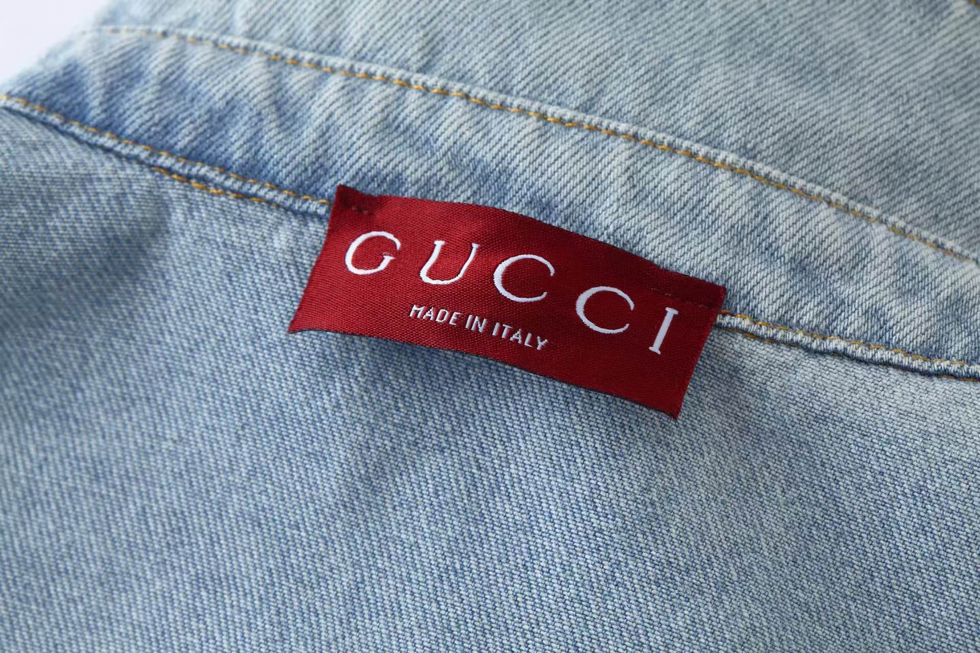 Embossed icon washed denim jacket