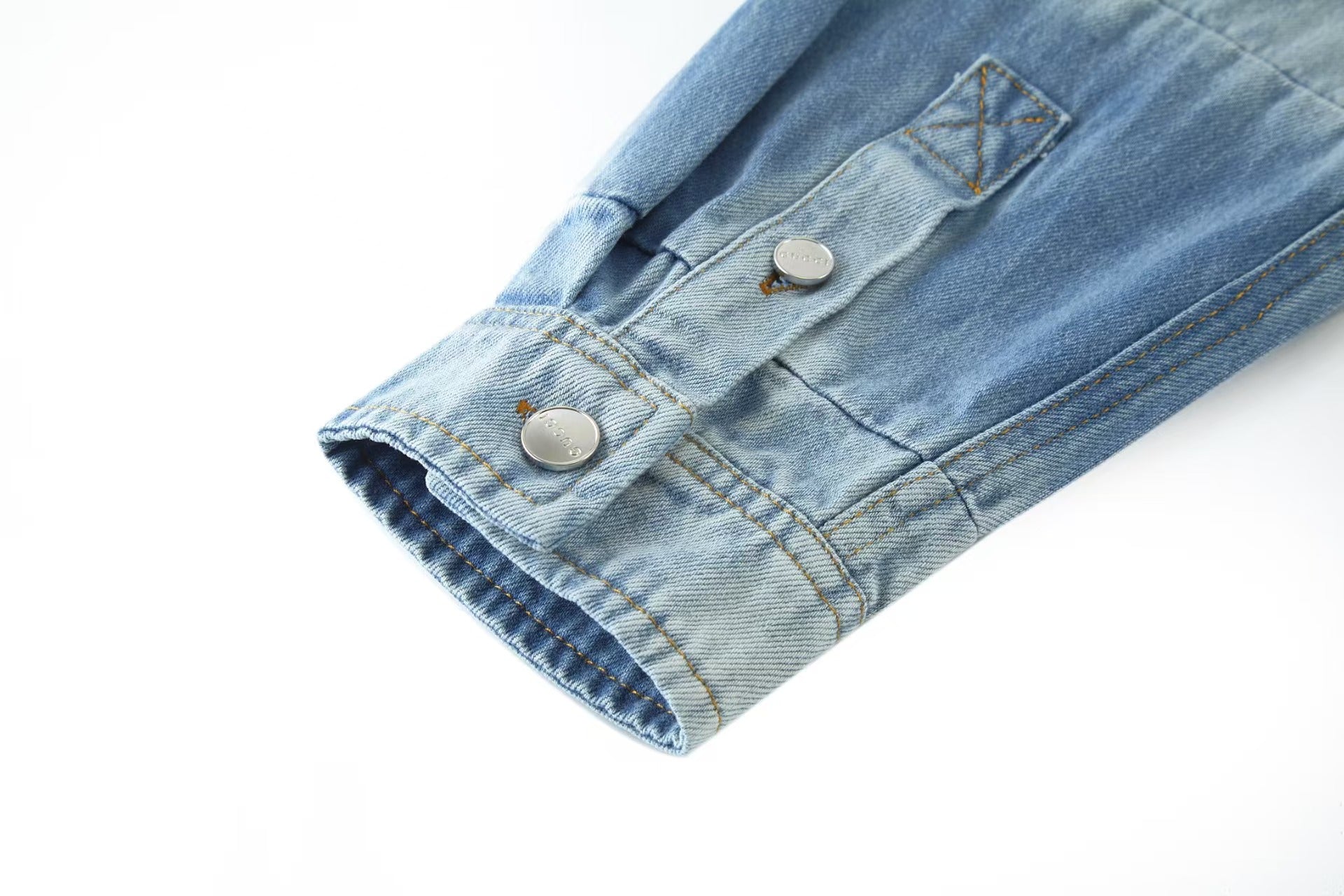 Embossed icon washed denim jacket