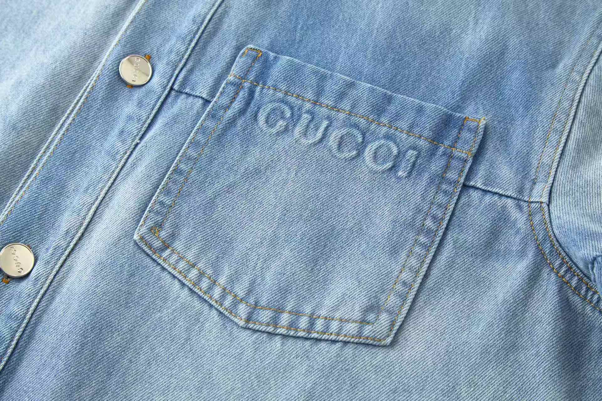 Embossed icon washed denim jacket