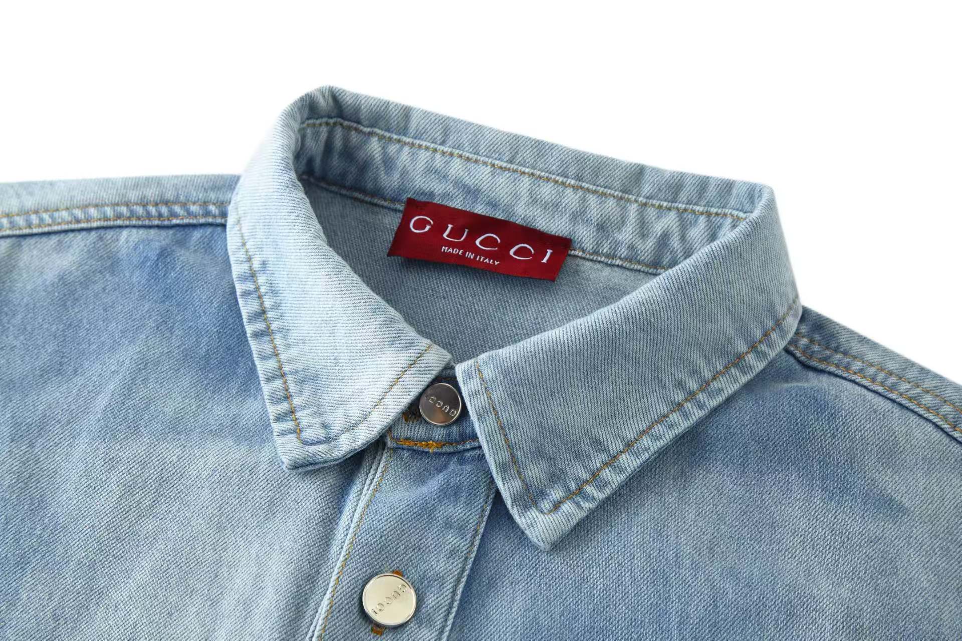 Embossed icon washed denim jacket