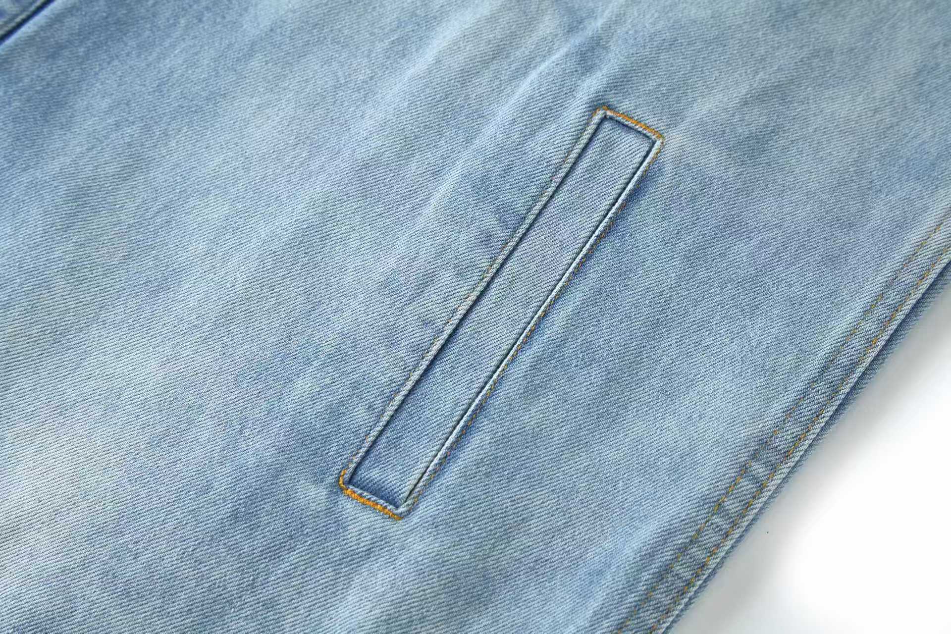 Embossed icon washed denim jacket