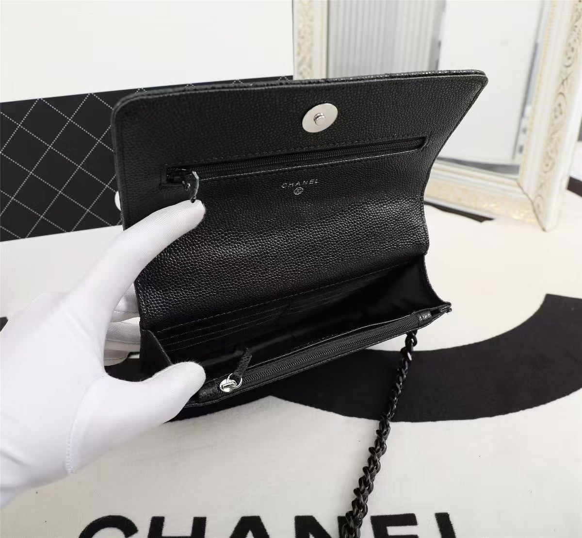 Particle embossed chain bag