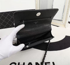 Particle embossed chain bag