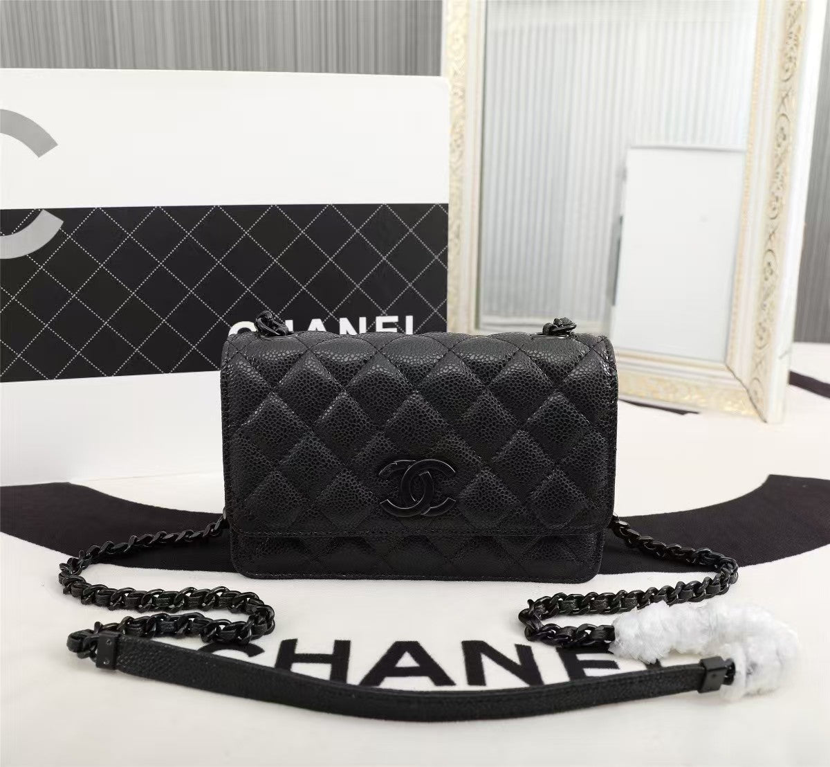 Particle embossed chain bag