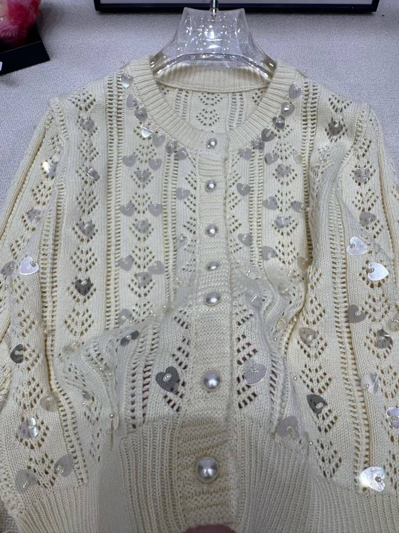 Hollow sweater cardigan