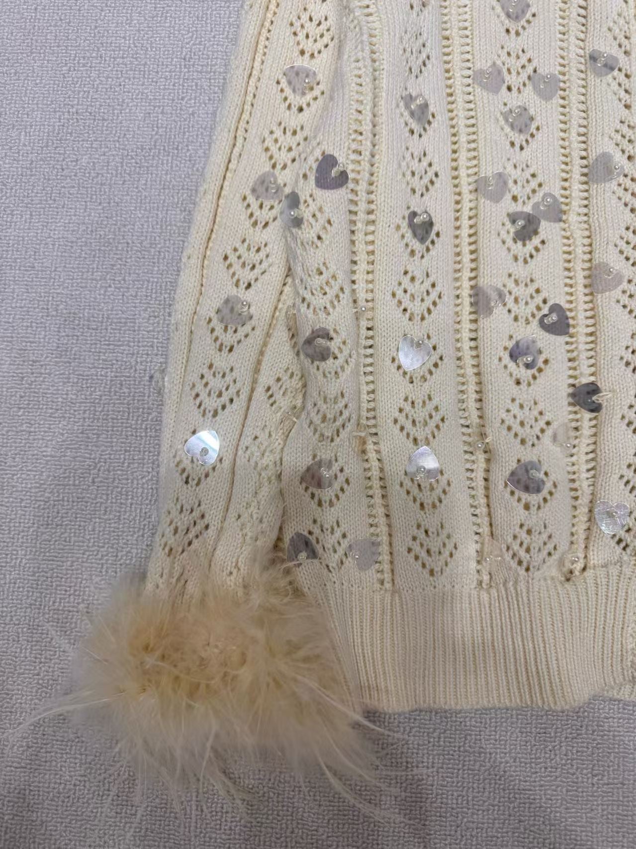 Hollow sweater cardigan