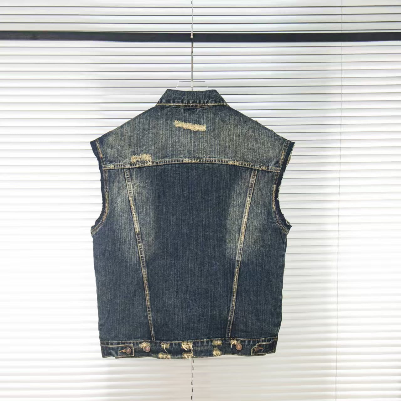 Wear and tear denim vest jacket with holes
