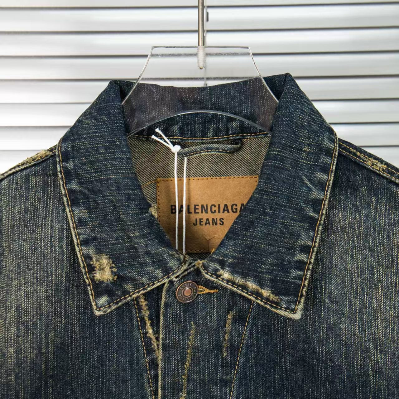Wear and tear denim vest jacket with holes