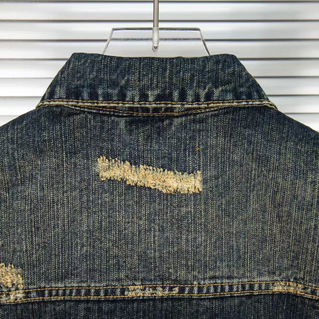 Wear and tear denim vest jacket with holes