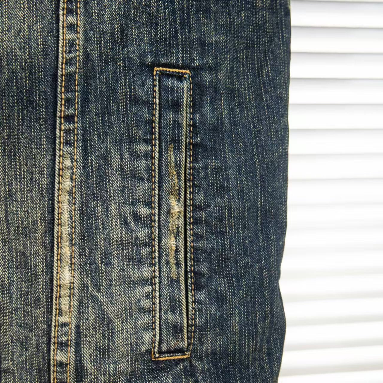 Wear and tear denim vest jacket with holes