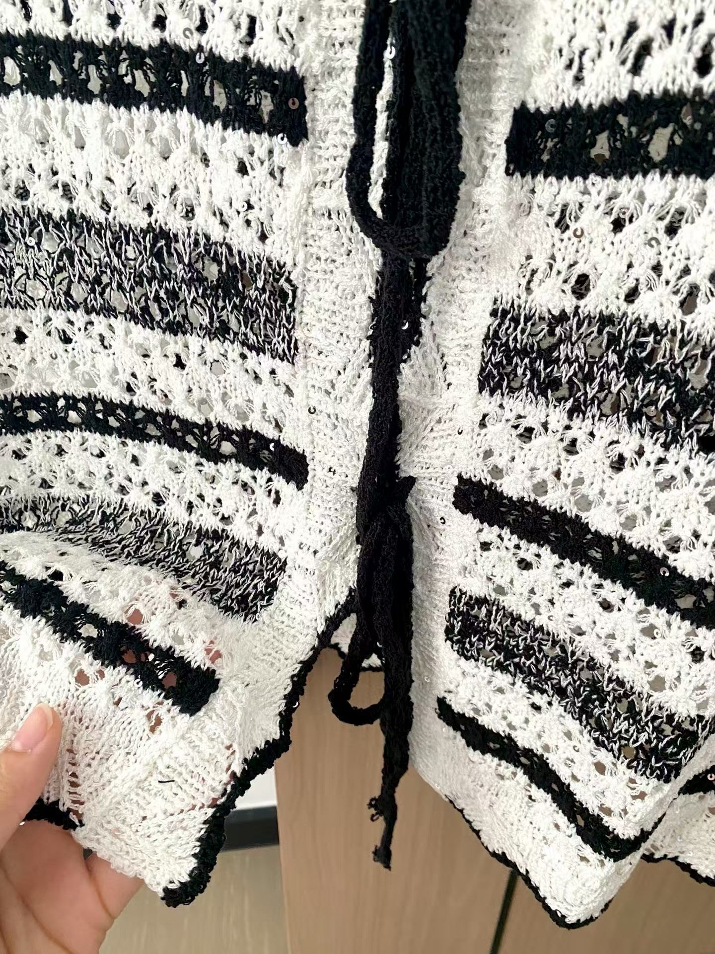 Simple black and white striped vest