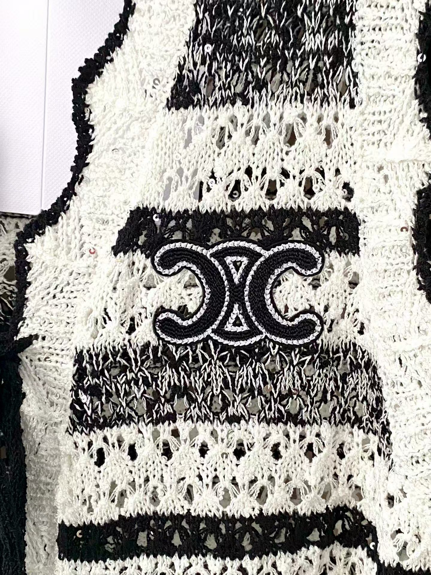 Simple black and white striped vest