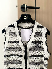 Simple black and white striped vest