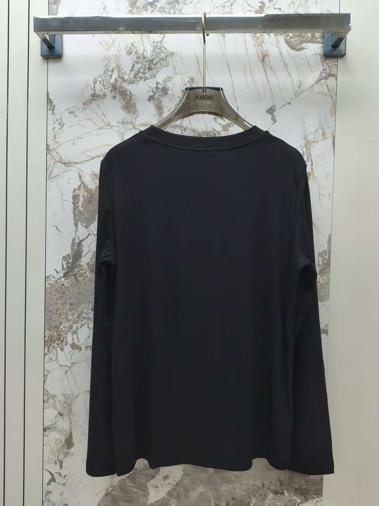 Embroidered round neck long sleeved top