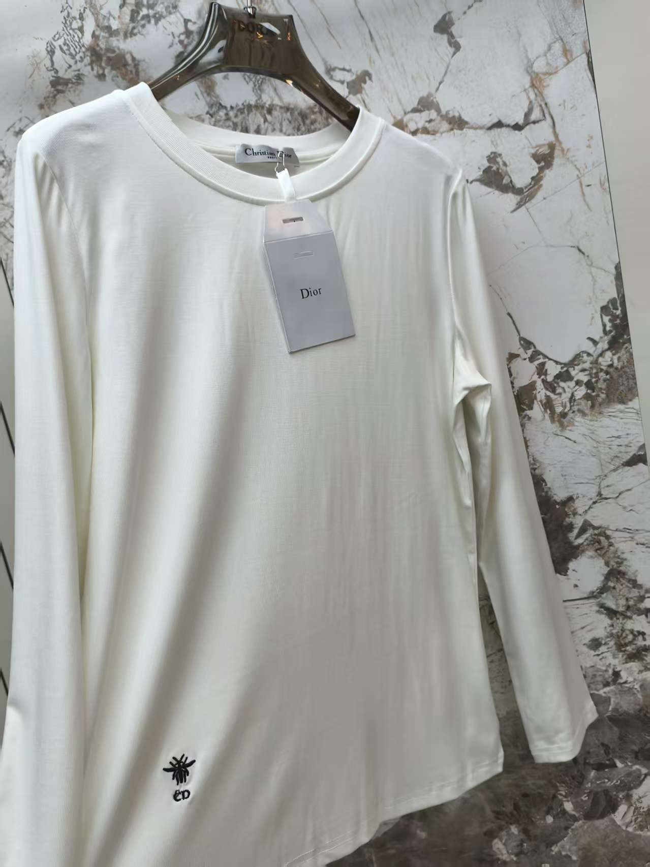 Embroidered round neck long sleeved top