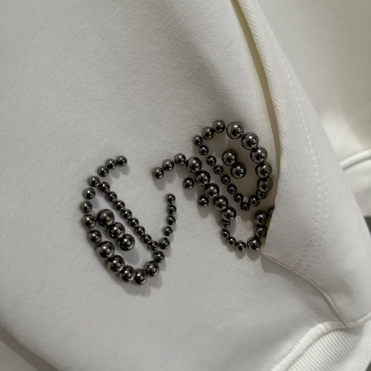 New long sleeved hooded sweatshirt