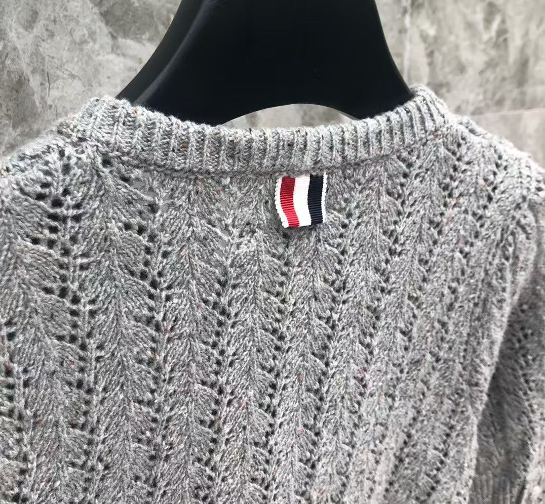 New hollowed out short sleeved cardigan