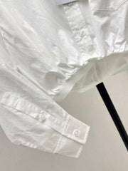 The new heavyweight is a short white shirt decorated with rhinestones