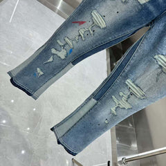 New distressed graffiti micro horn elastic jeans