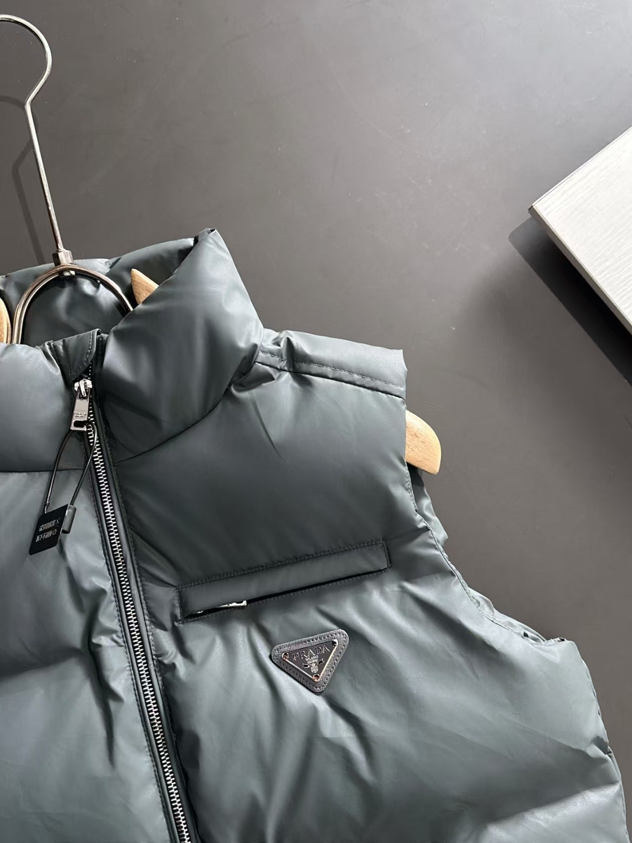 New pocket style coated down vest