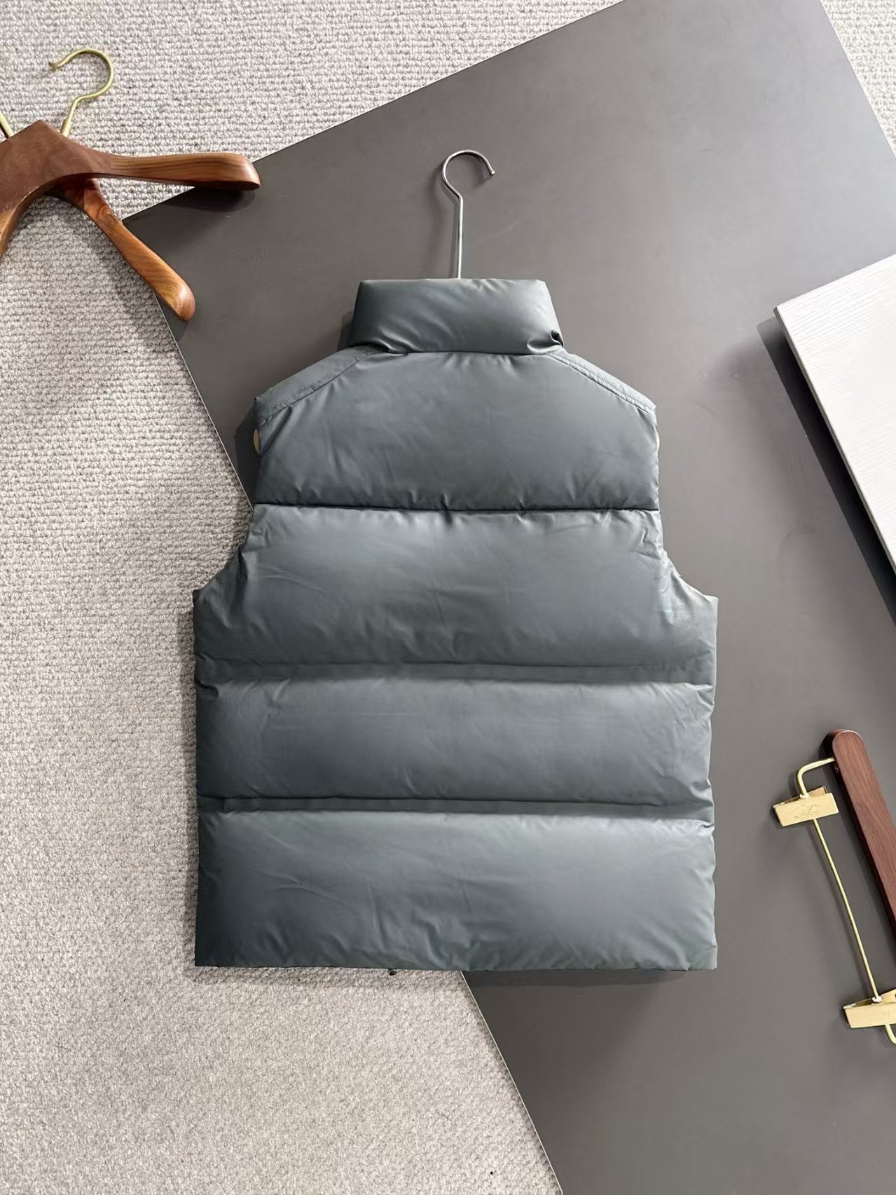 New pocket style coated down vest