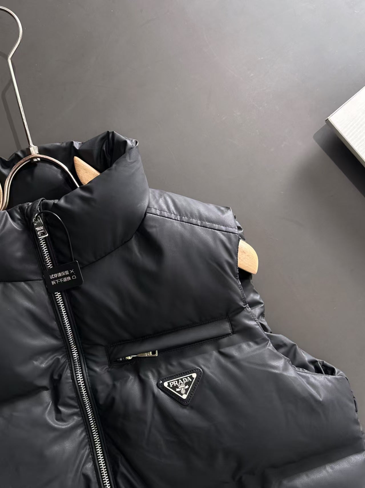 New pocket style coated down vest