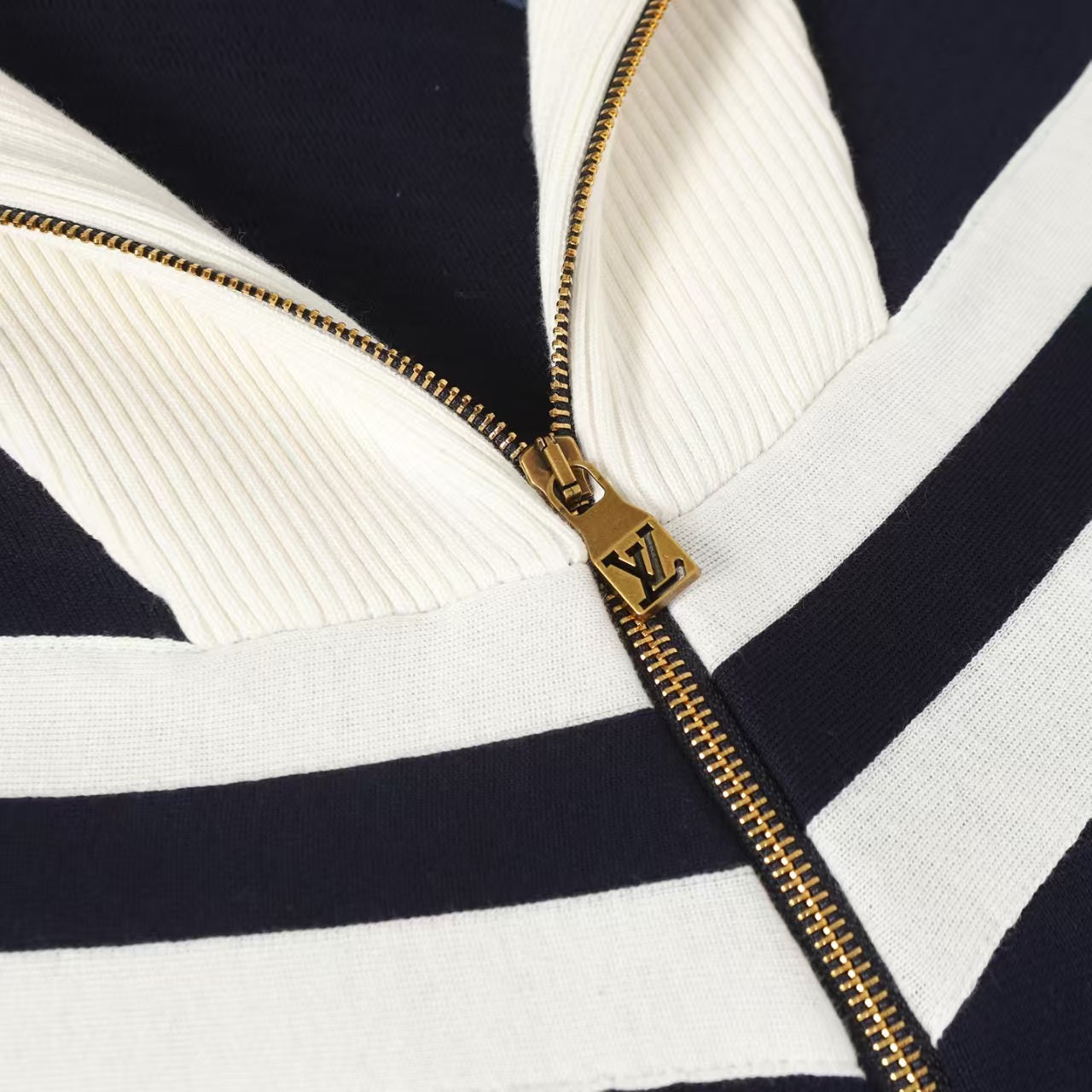 New striped contrasting stand up collar sweater