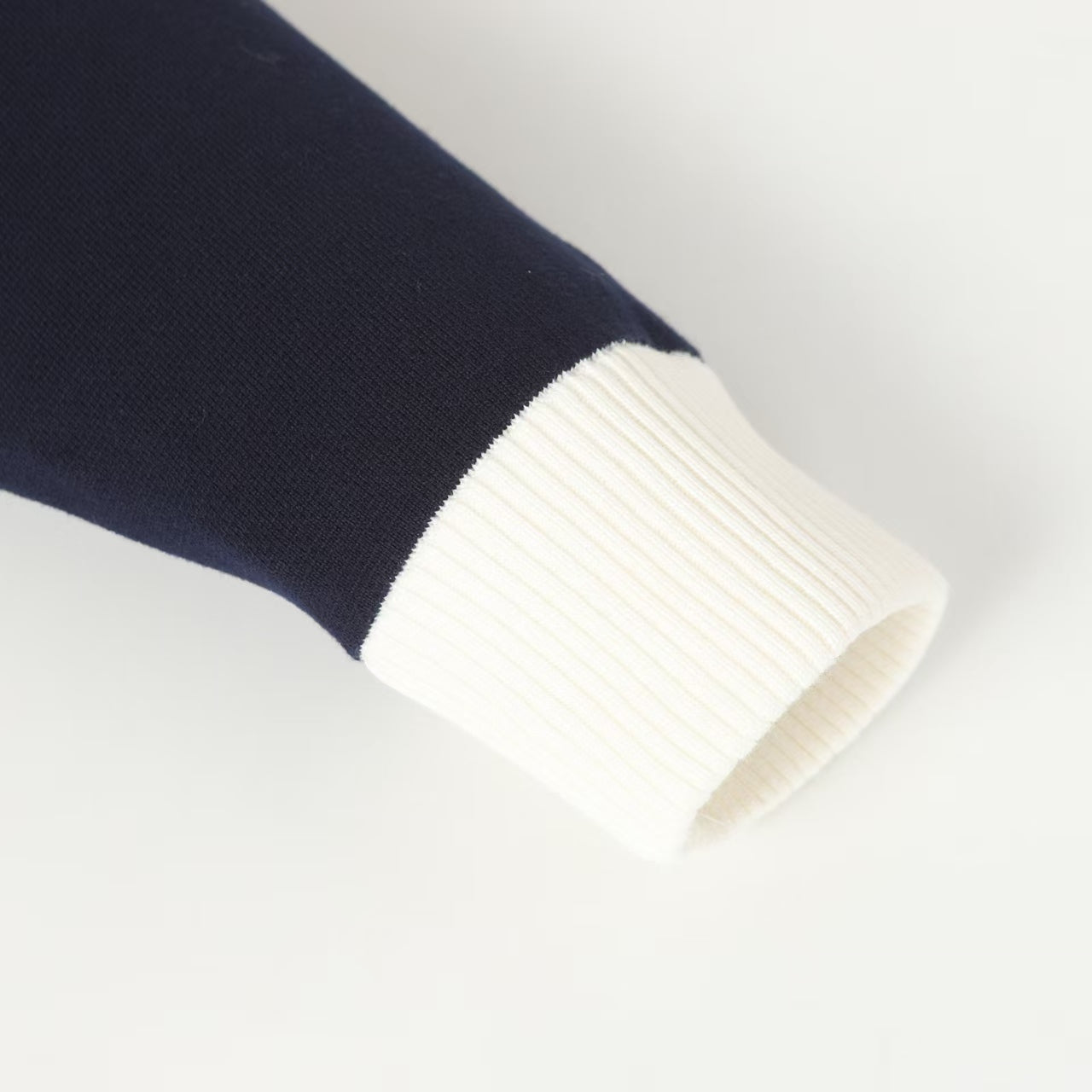 New striped contrasting stand up collar sweater