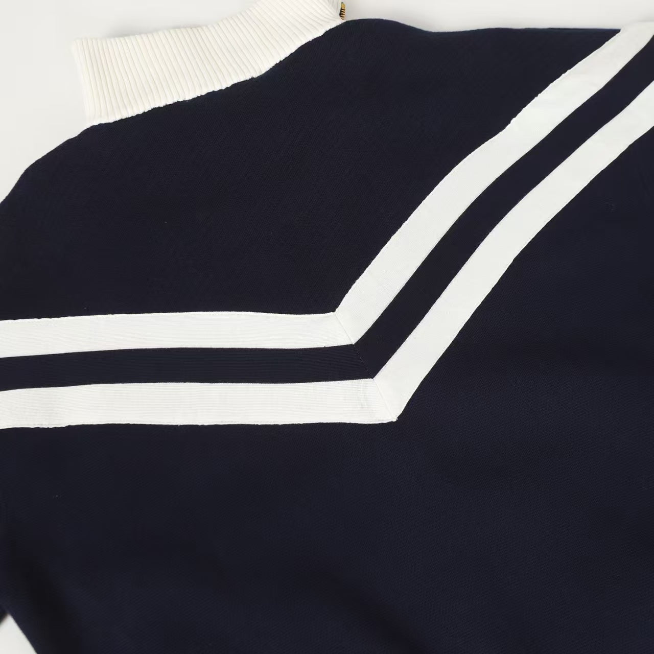 New striped contrasting stand up collar sweater