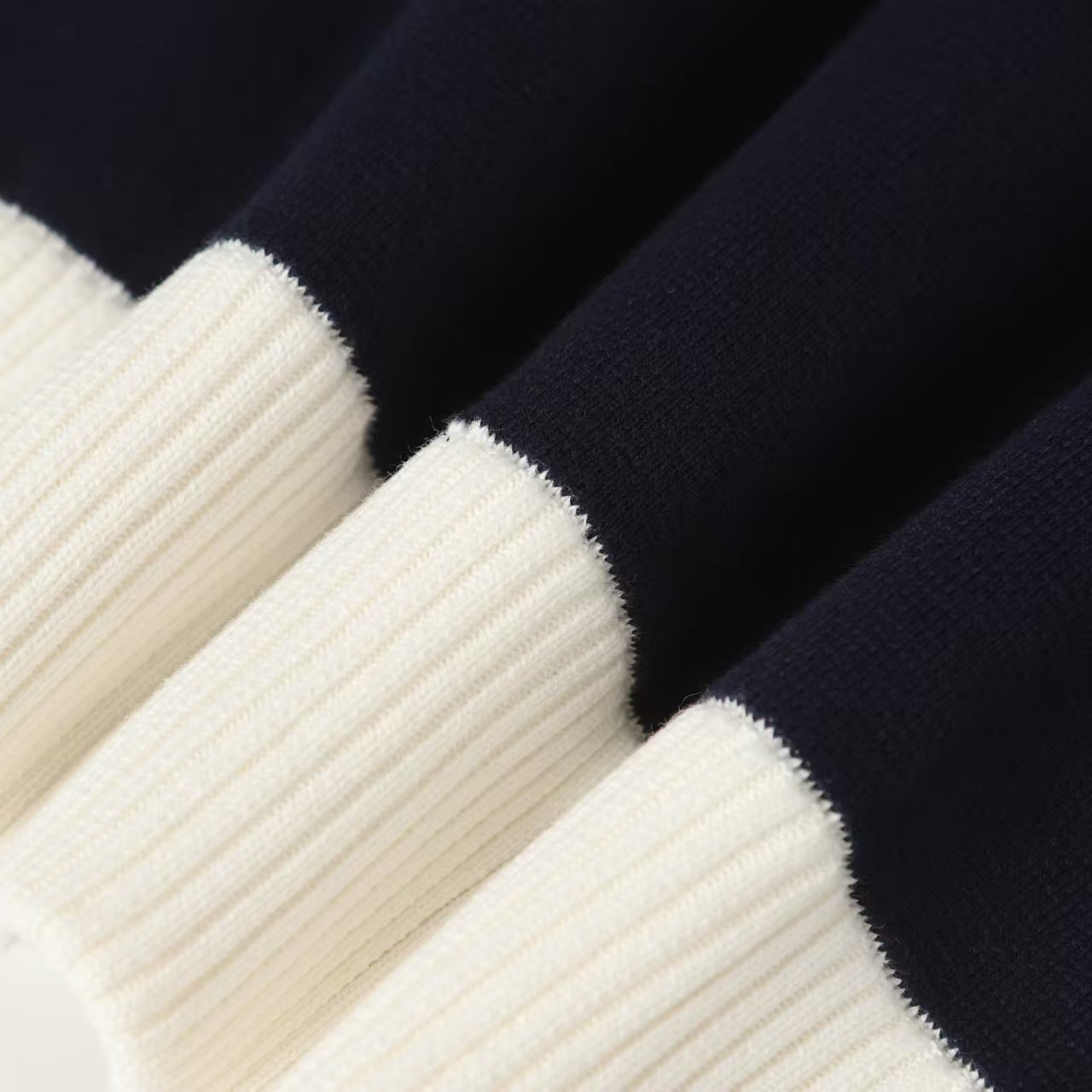 New striped contrasting stand up collar sweater