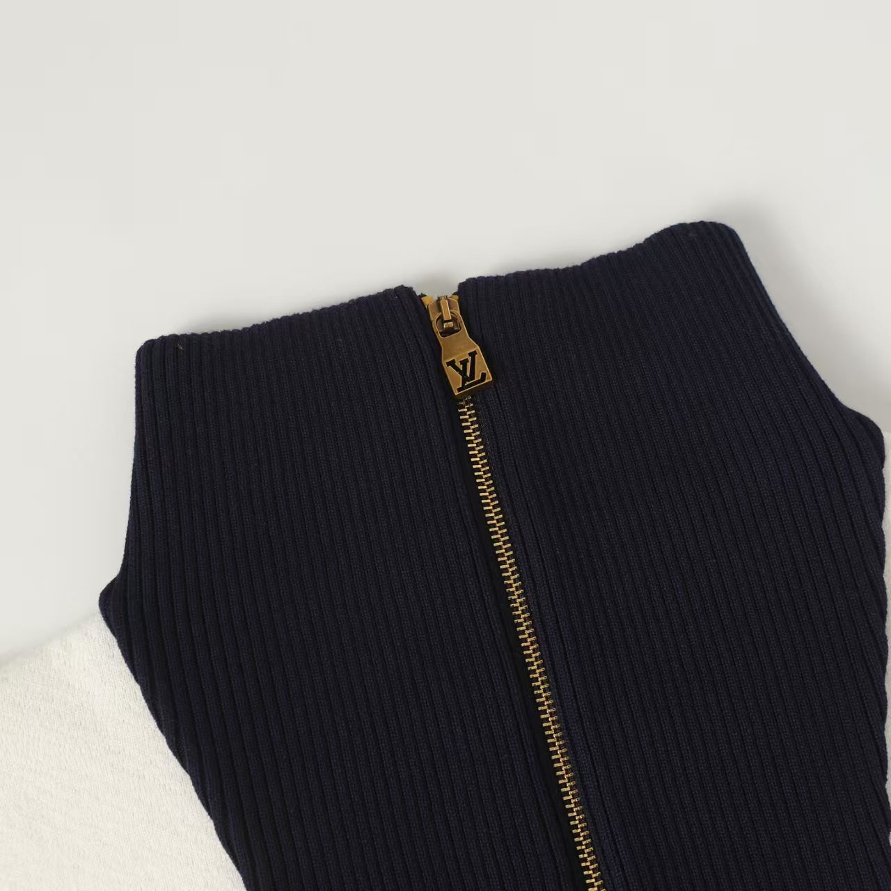 New striped contrasting stand up collar sweater