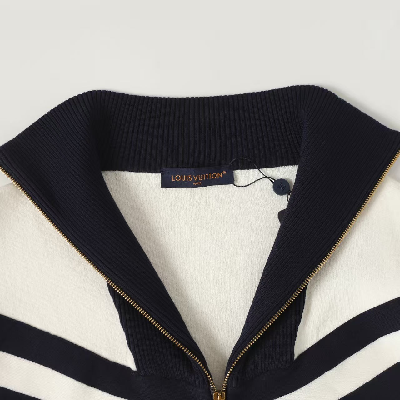 New striped contrasting stand up collar sweater