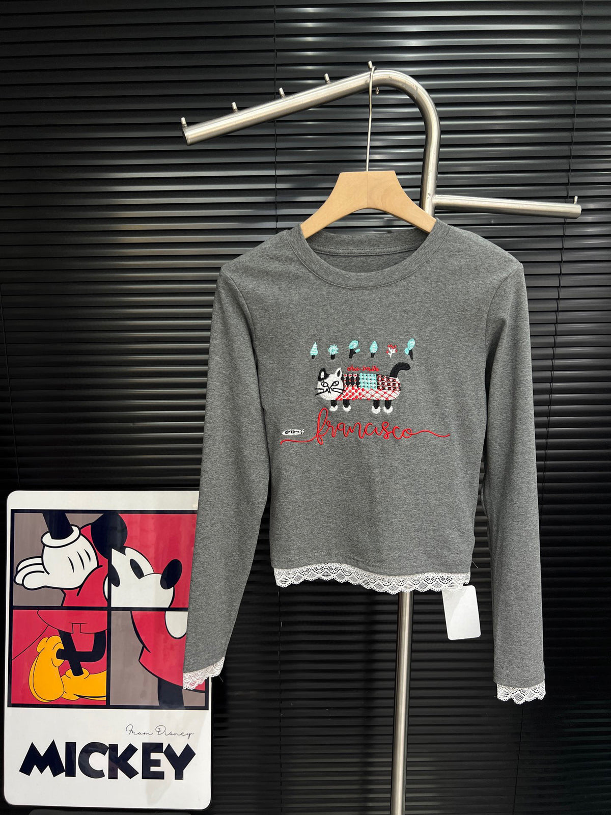 Embroidered cat lace design with cotton base and long sleeves