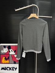 Embroidered cat lace design with cotton base and long sleeves