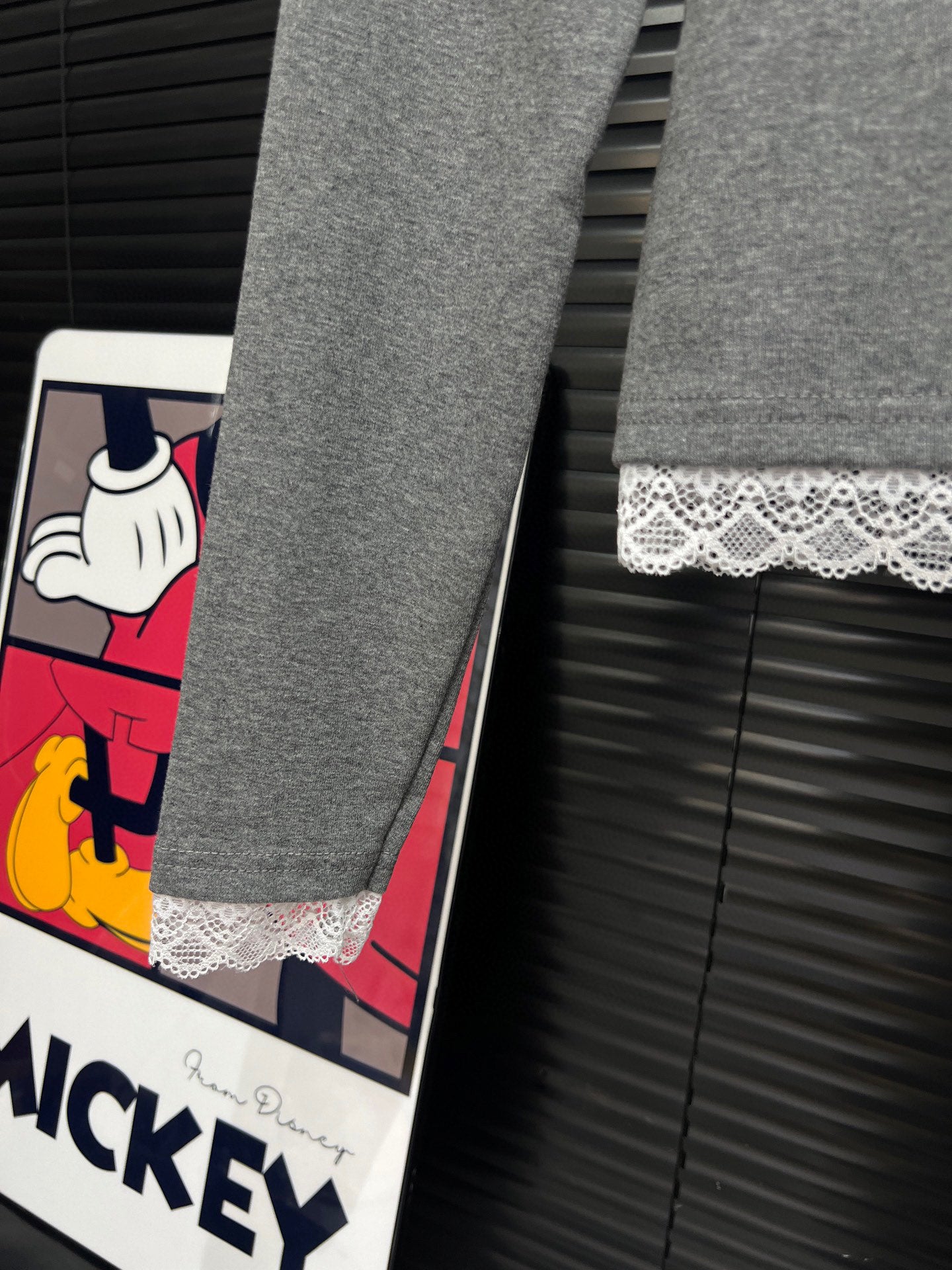 Embroidered cat lace design with cotton base and long sleeves
