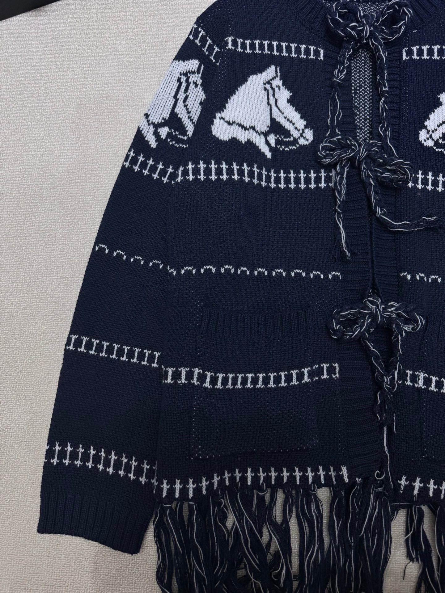 Medium to long tied tassel knit jacket