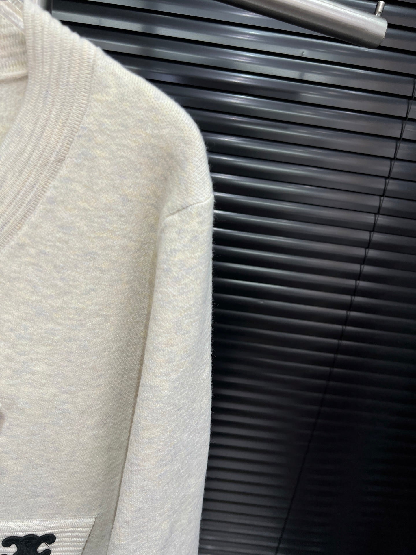 Gentle knitted cardigan with bow tie