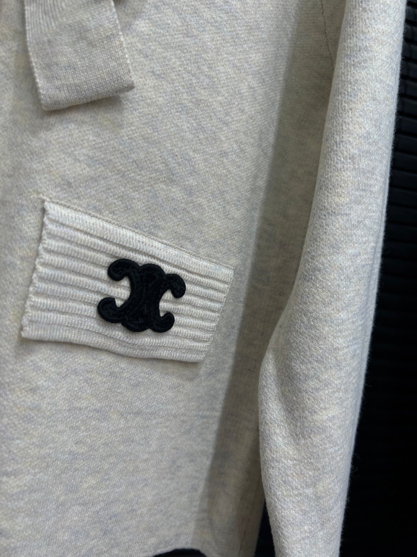 Gentle knitted cardigan with bow tie