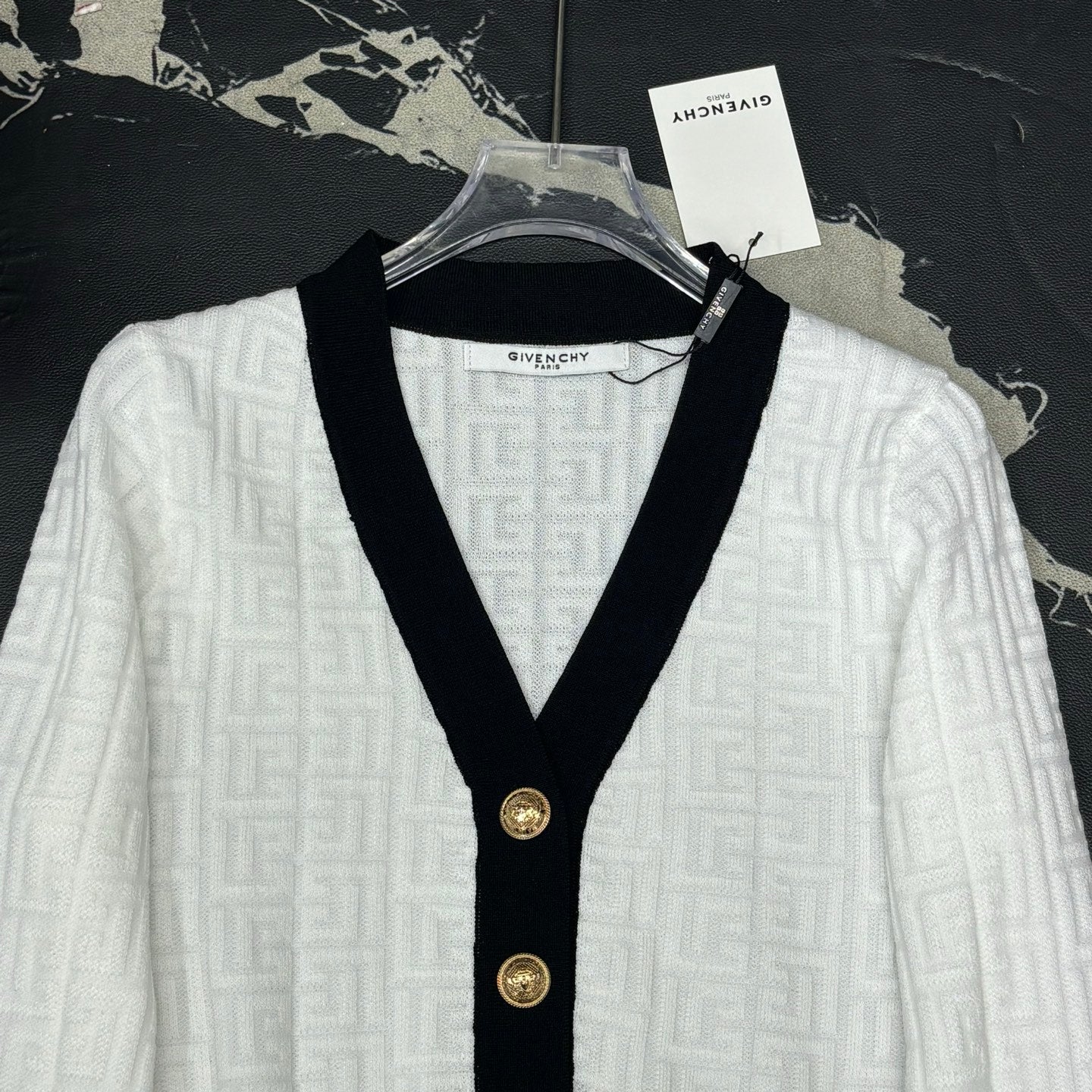 V-neck dark patterned logo cardigan