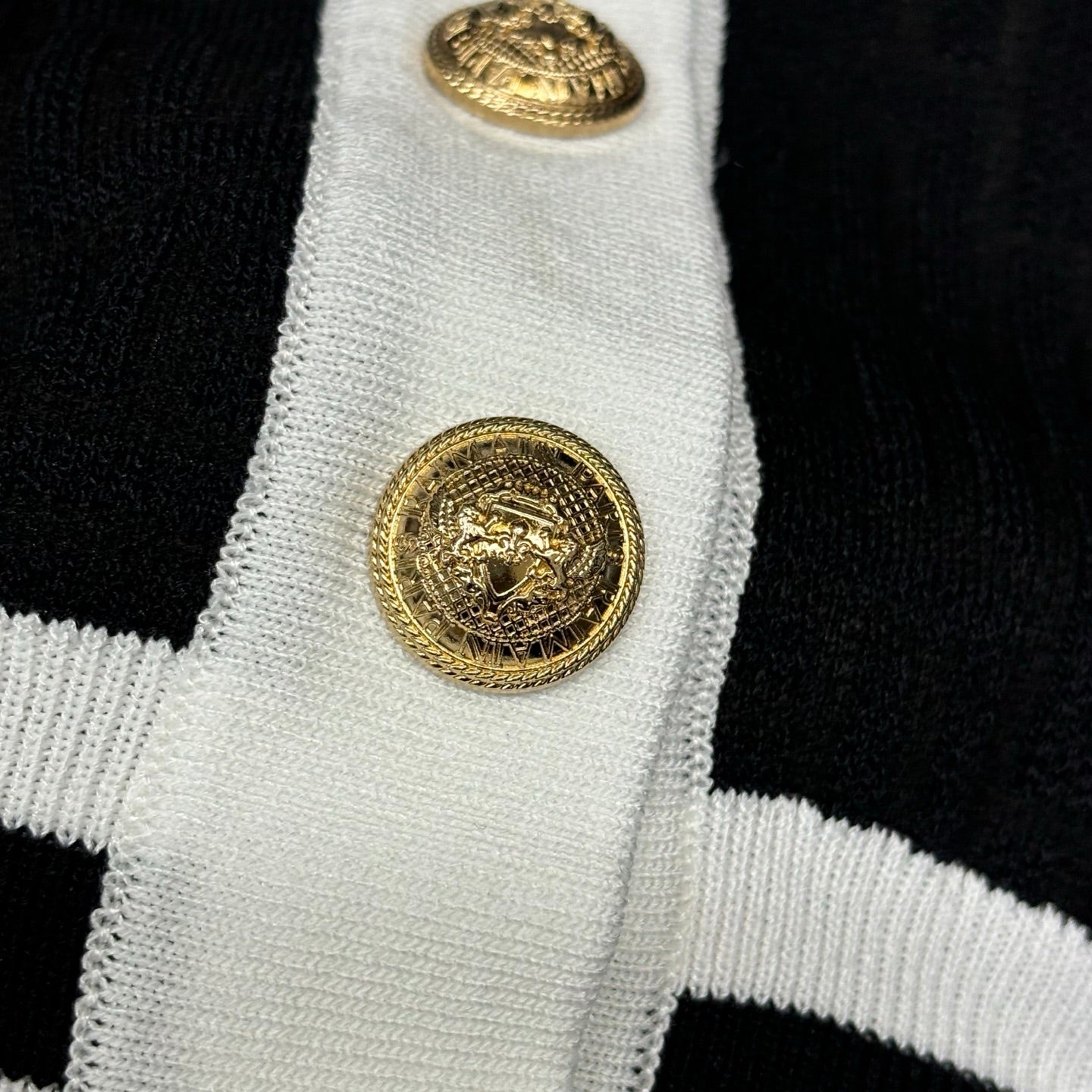 V-neck dark patterned logo cardigan