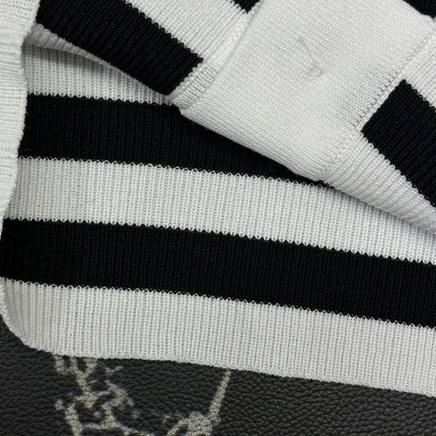 V-neck dark patterned logo cardigan