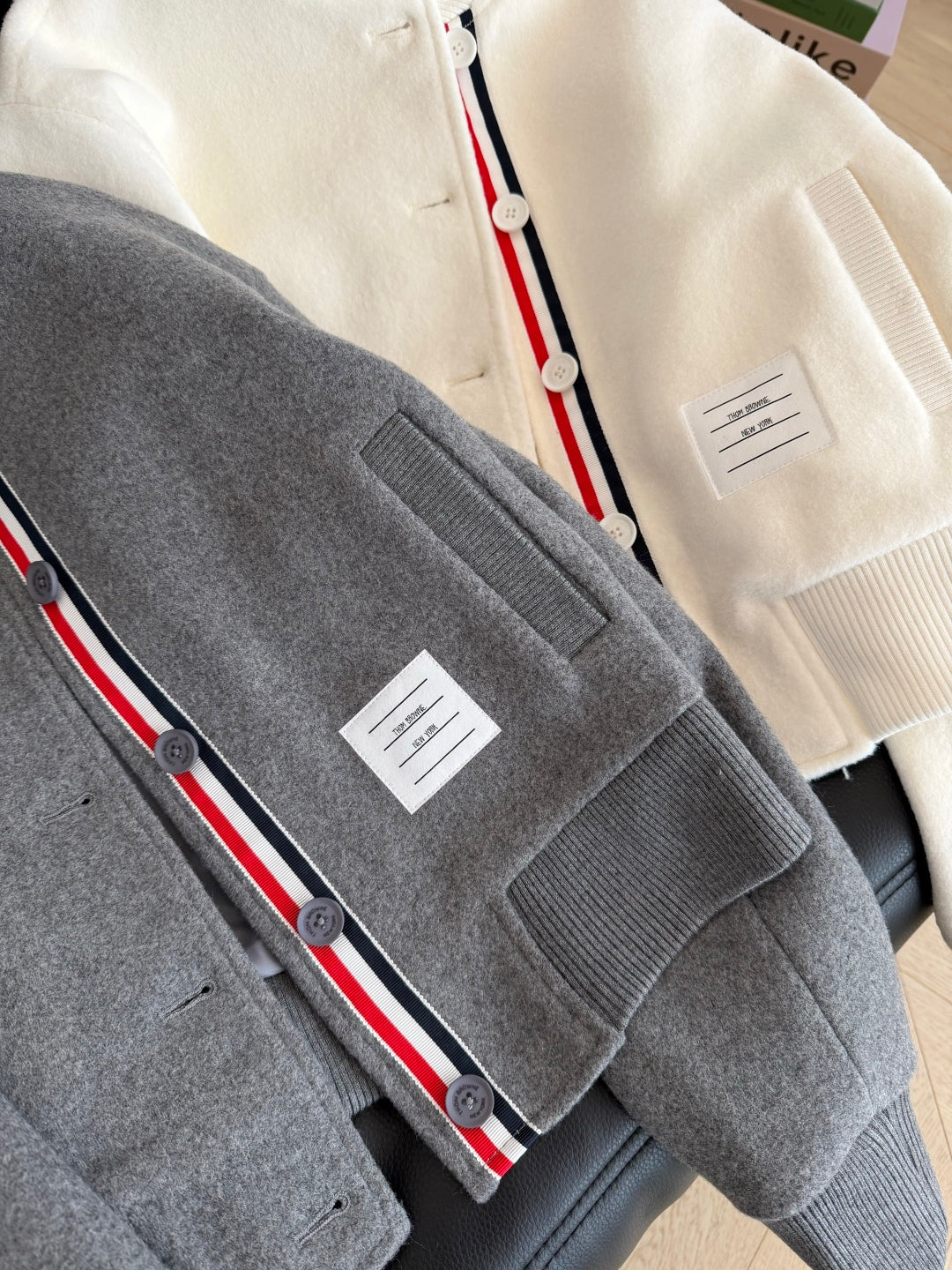 Classic contrasting ribbon splicing woolen baseball jersey